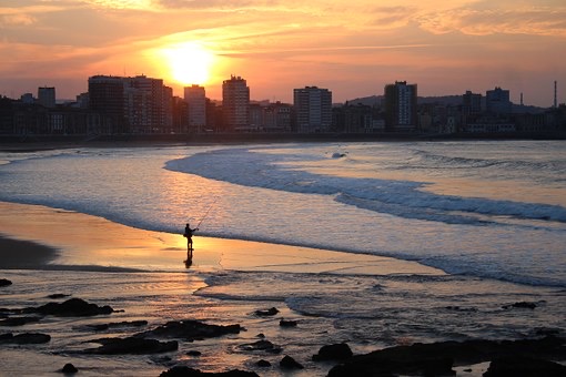 atardecer desde la playa de gijon